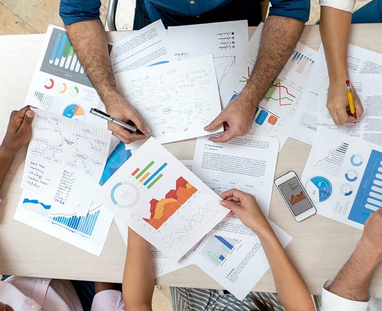 Pools & Funds Group reviewing charts
